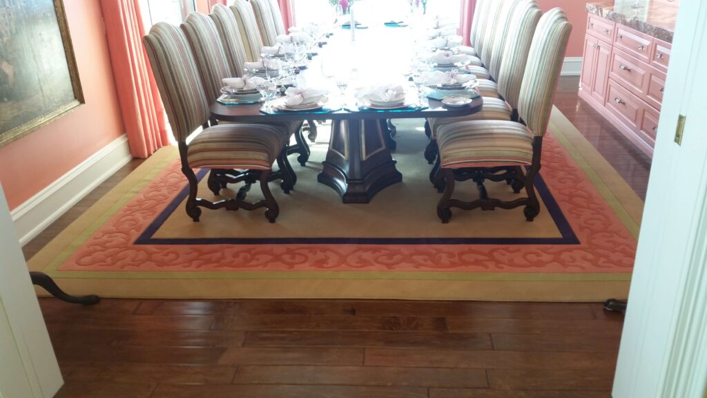Multi-colored custom rug in formal dining room